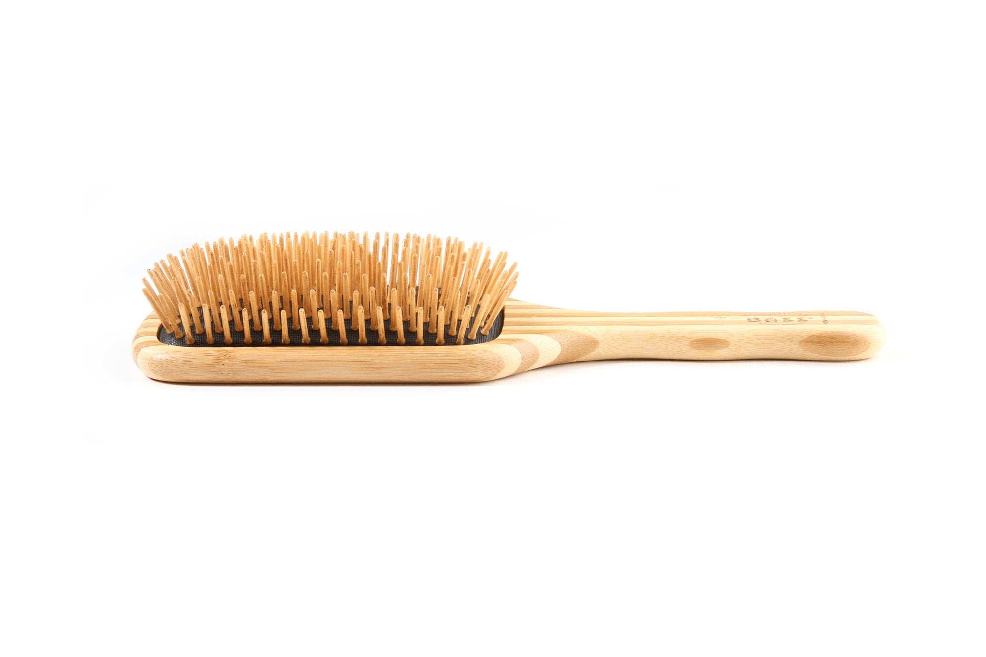 Bass The Green Brush packaging flatlay emphasizes eco-friendly materials.