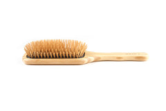 Bass The Green Brush packaging flatlay emphasizes eco-friendly materials.