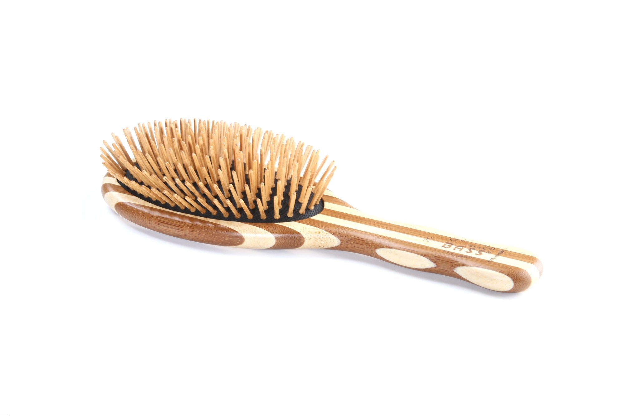 Bass Green Brush Vegan Approved emphasizes plant-based materials for eco-conscious grooming.