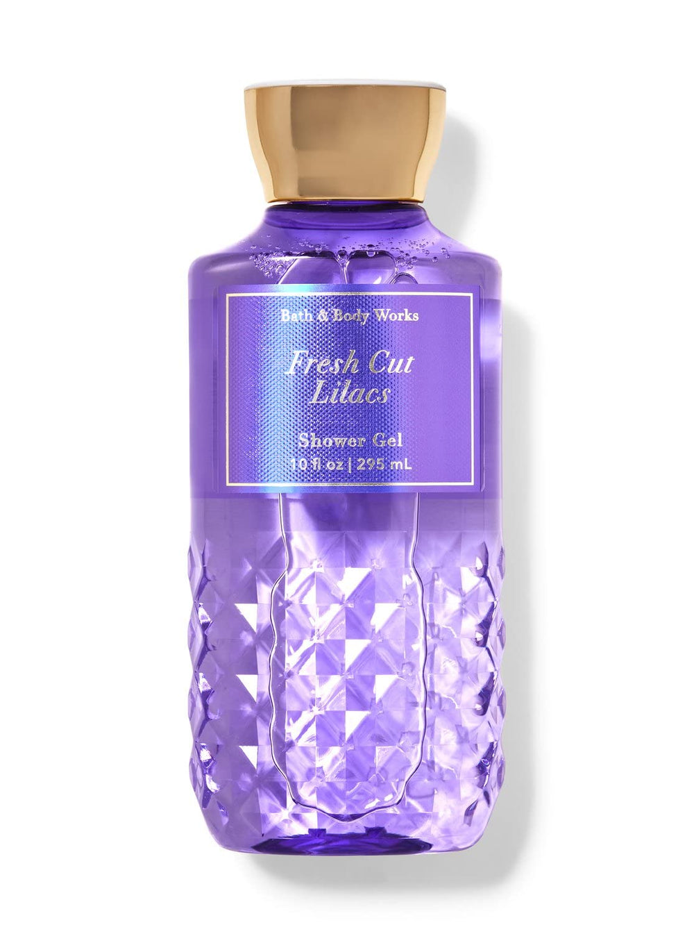 Closeup of Fresh Cut Lilacs bottle emphasizes lilac bouquet notes for spring skincare.