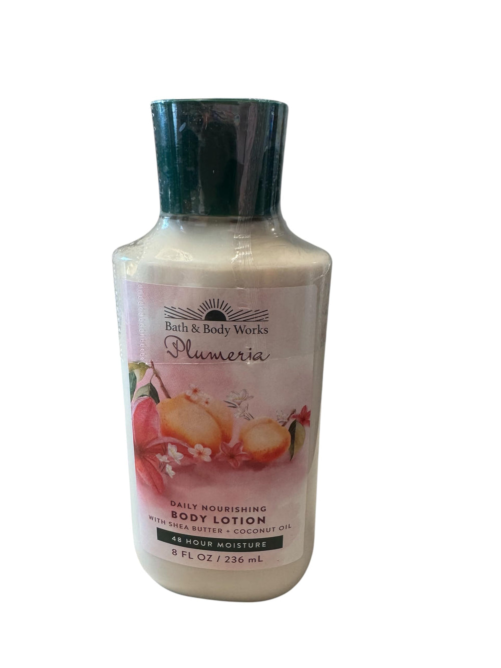Bath & Body Works Plumeria lotion bottle with creamy texture for quick moisturization
