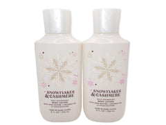 Bath and Body Works Snowflakes and Cashmere 8oz bottles front view for silky hydration.