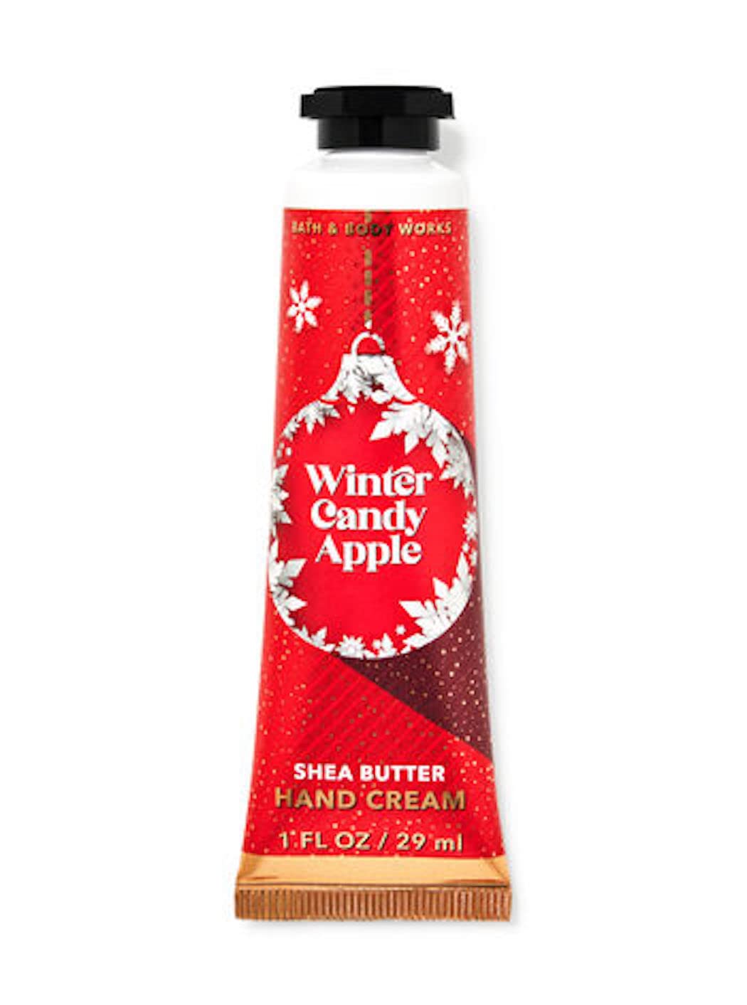 Bath & Body Works Winter Candy Apple travel-size hand cream nourishes hands with quick absorption and soft texture.