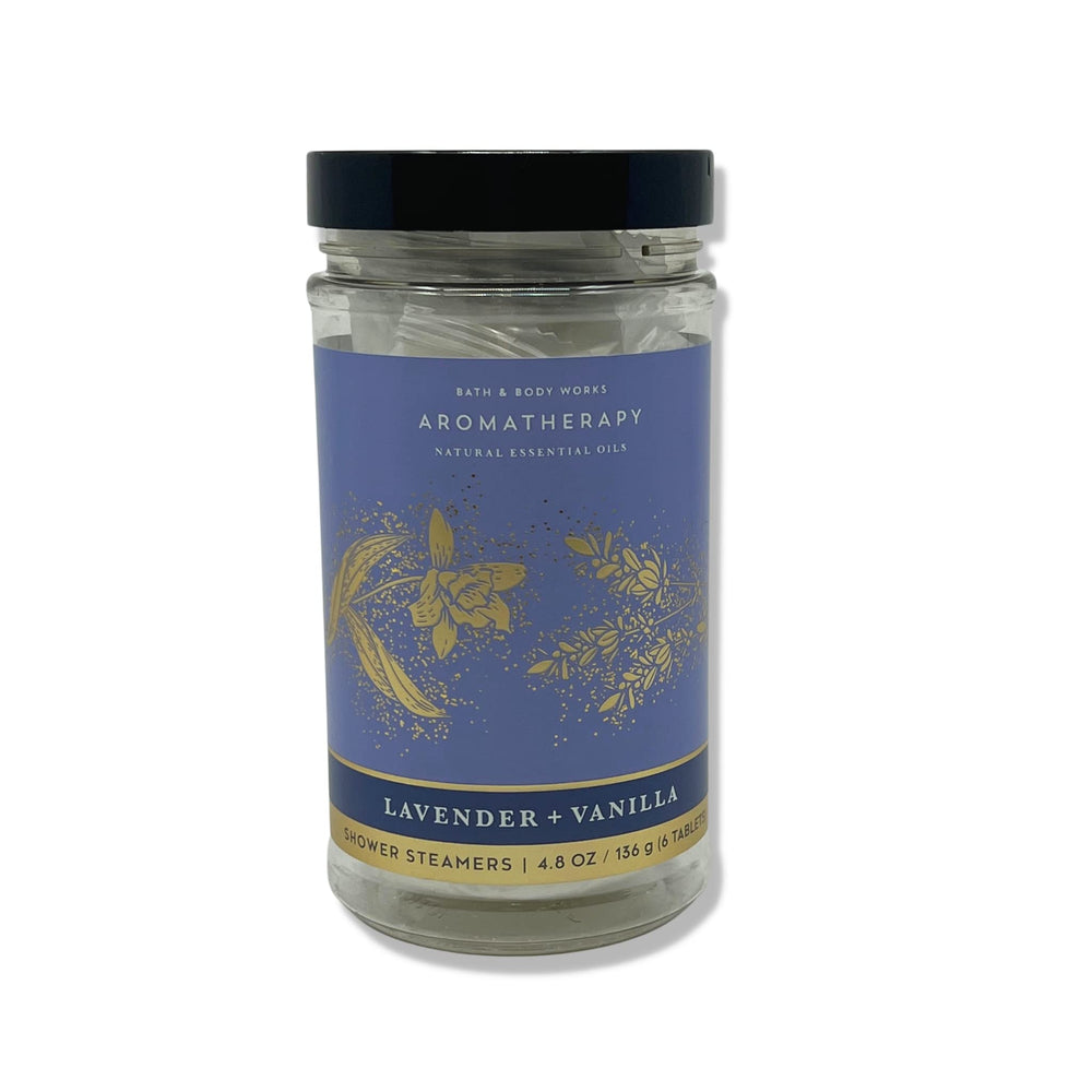 Bath and Body Works Aromatherapy shower steamers in a spa-like shower scene