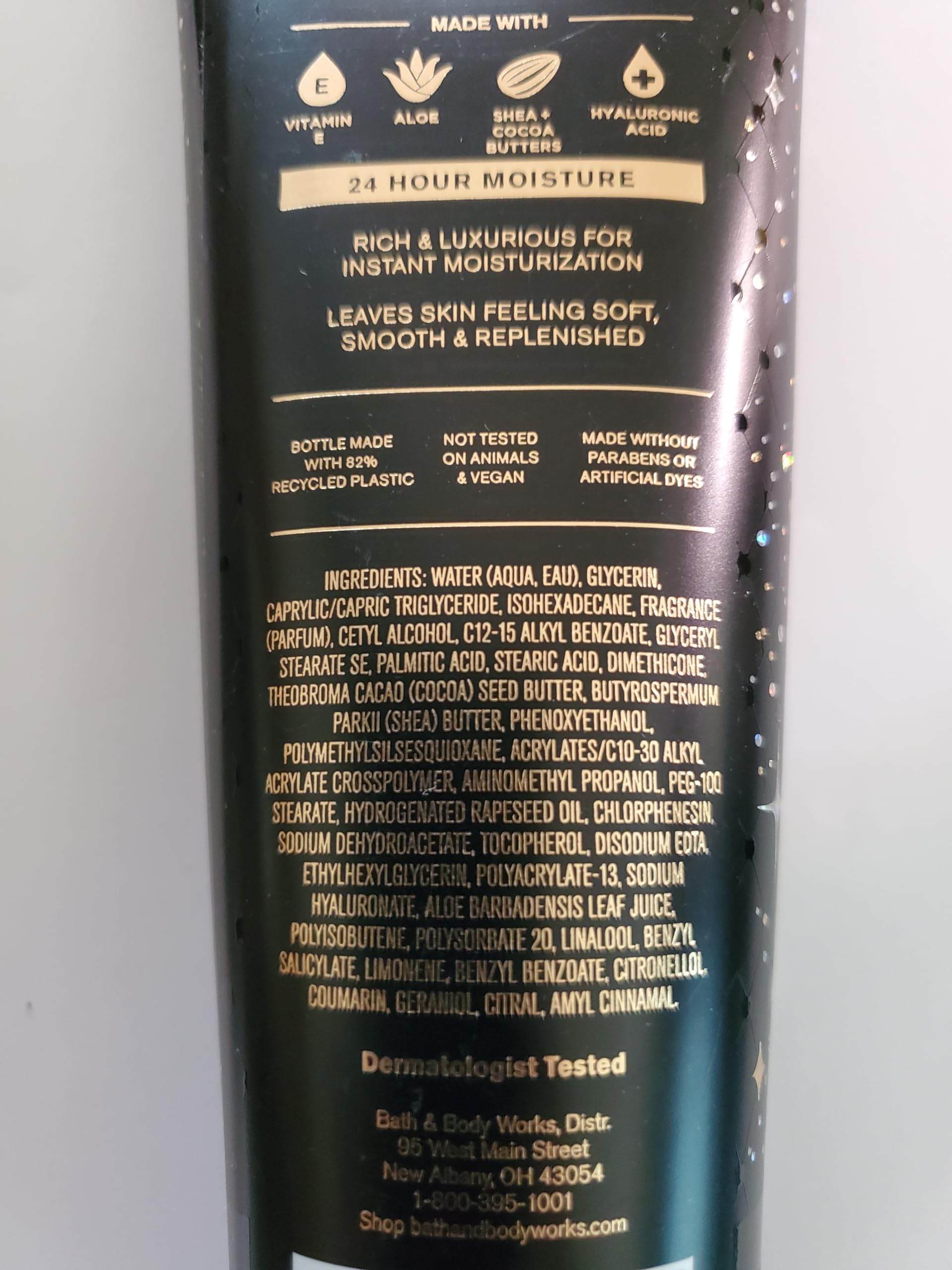 Bath & Body Works Into the Night 8 oz jar beside pump demonstrates easy everyday use.