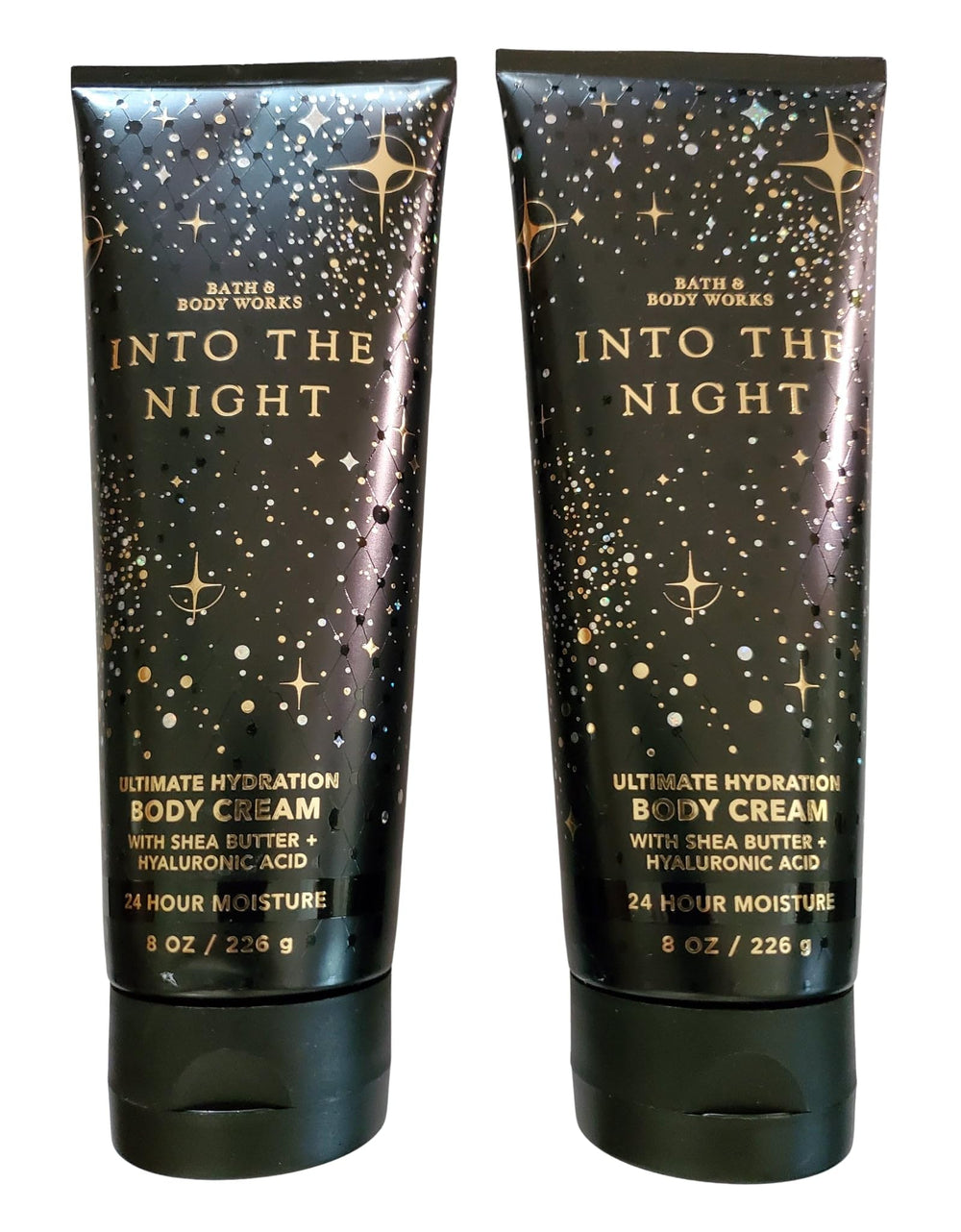 Bath & Body Works Into the Night hydration cream bottle front for smooth skin after shower.