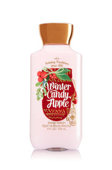 Bath & Body Works Winter Candy Apple lotion bottle showing non-greasy daily hydration for soft skin.