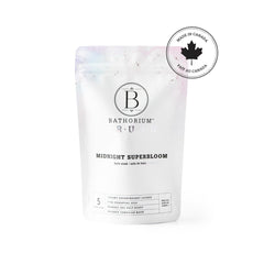 Bathorium Midnight Superbloom Crush butterfly-pea-flower creates violet bath color for a soothing soak.