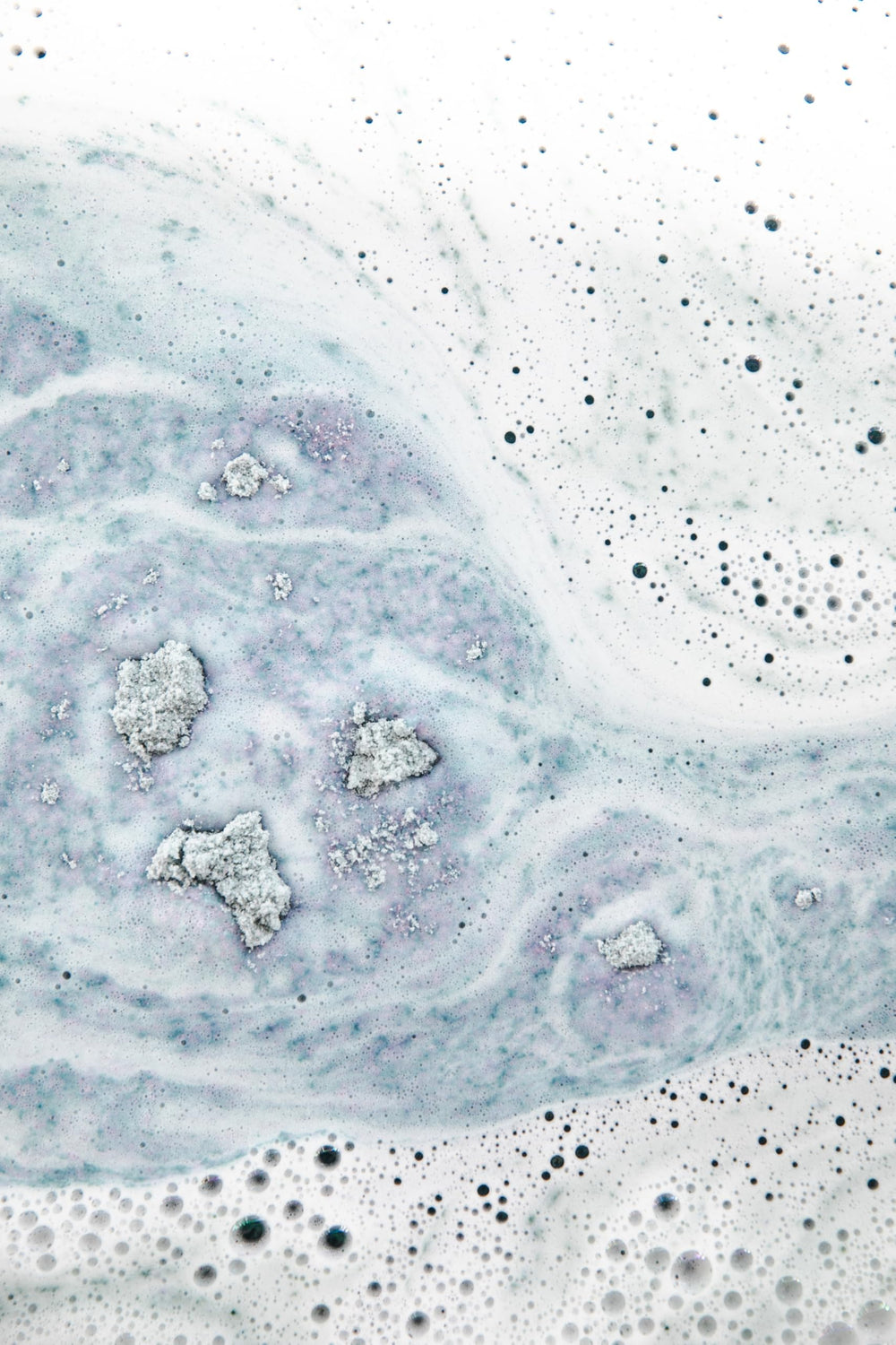 Bathorium Midnight Superbloom Crush dead-sea-salt crystals hydrate and revitalize skin.