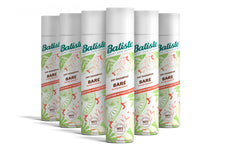 Batiste Bare dry shampoo bottle on a vanity for quick oil control between washes.