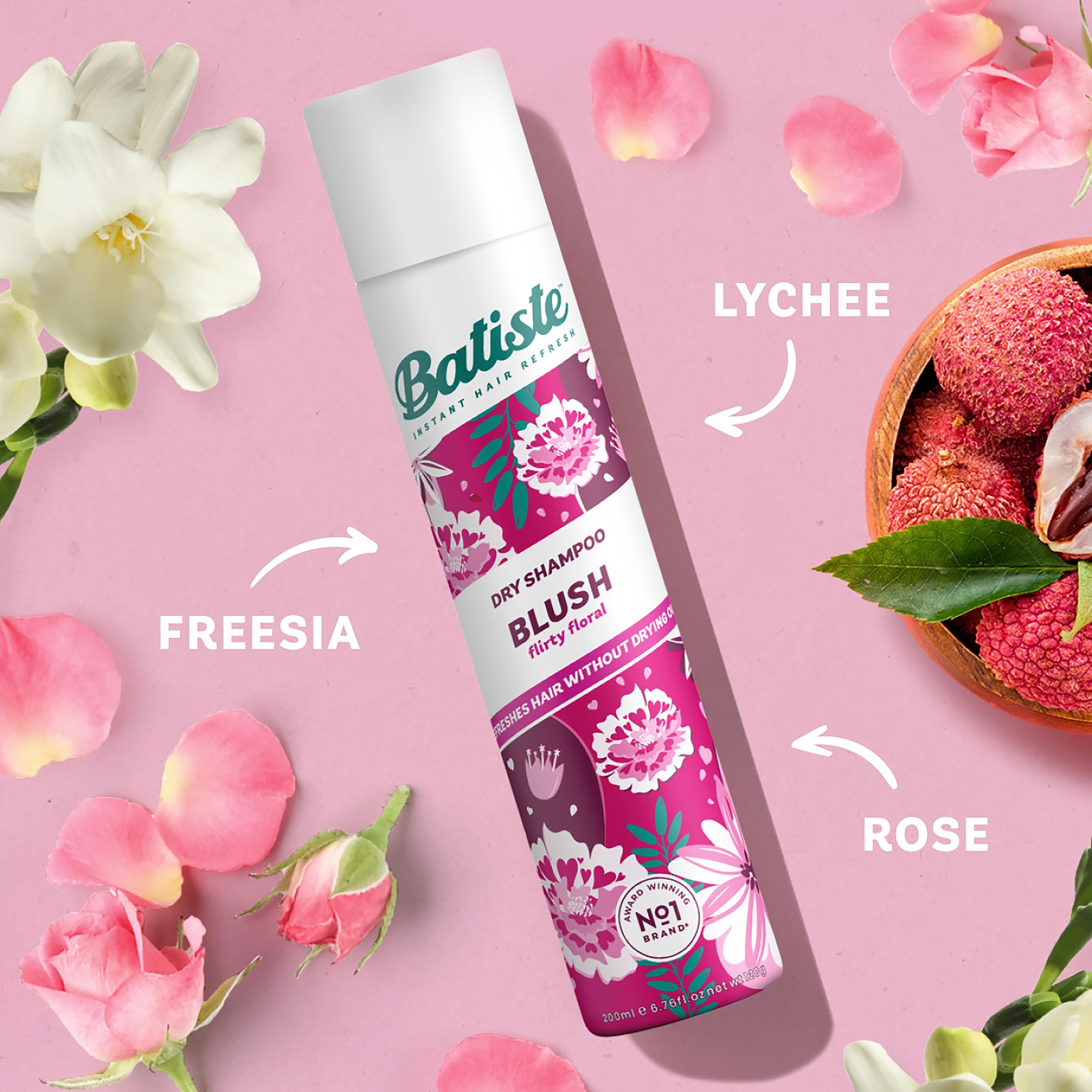Batiste Dry Blush spray distributing light powder for added volume and grip.