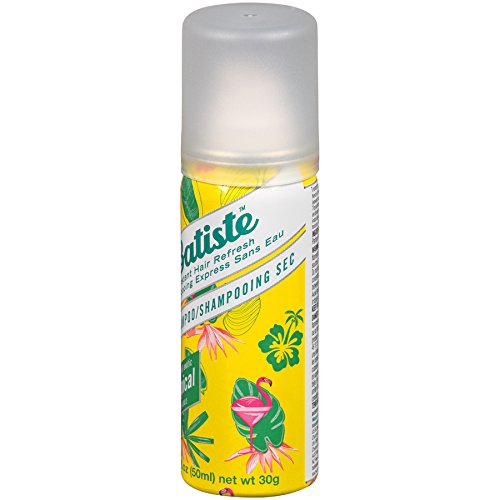 Batiste Tropical can tilted for easy spray and instant lift.