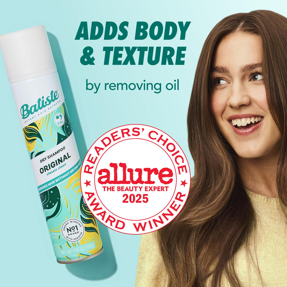 Batiste Original spray bottle in use, spraying at roots for lift