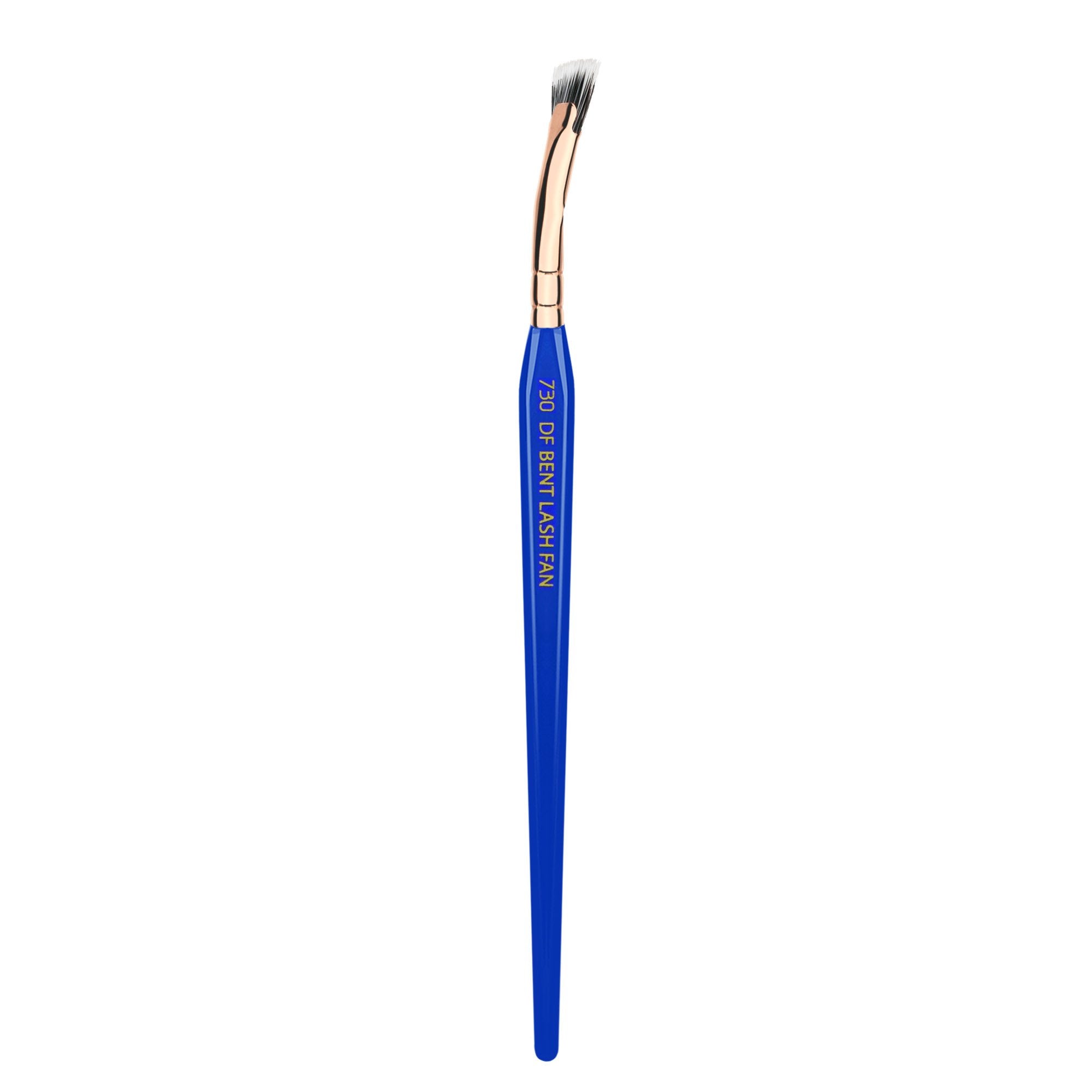 Bdellium Tools Golden Triangle 730 Bent Mascara Fan with blue handle for precise application.