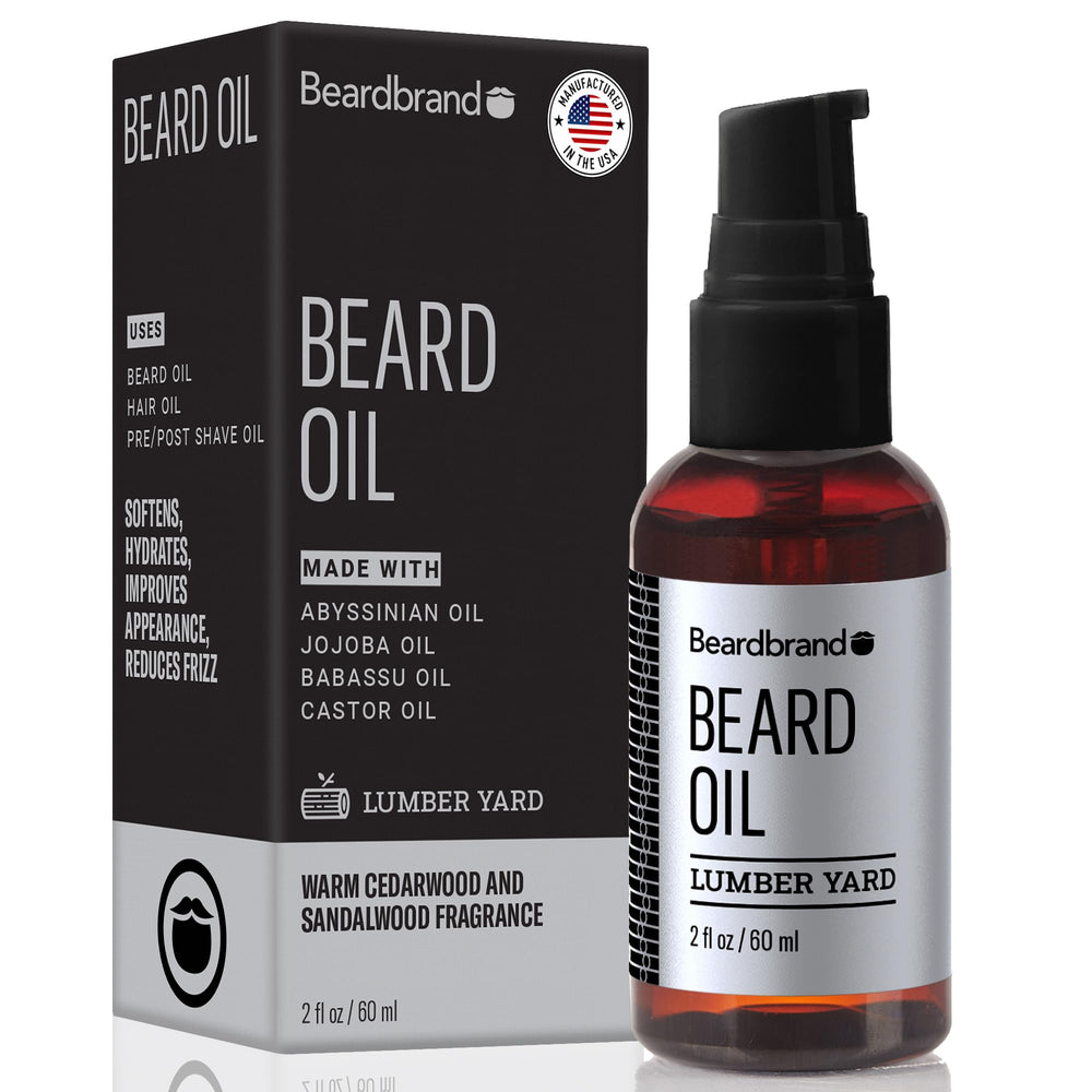 Beardbrand beard oil bottle shows jojoba and Vitamin E for silky-smooth beard.