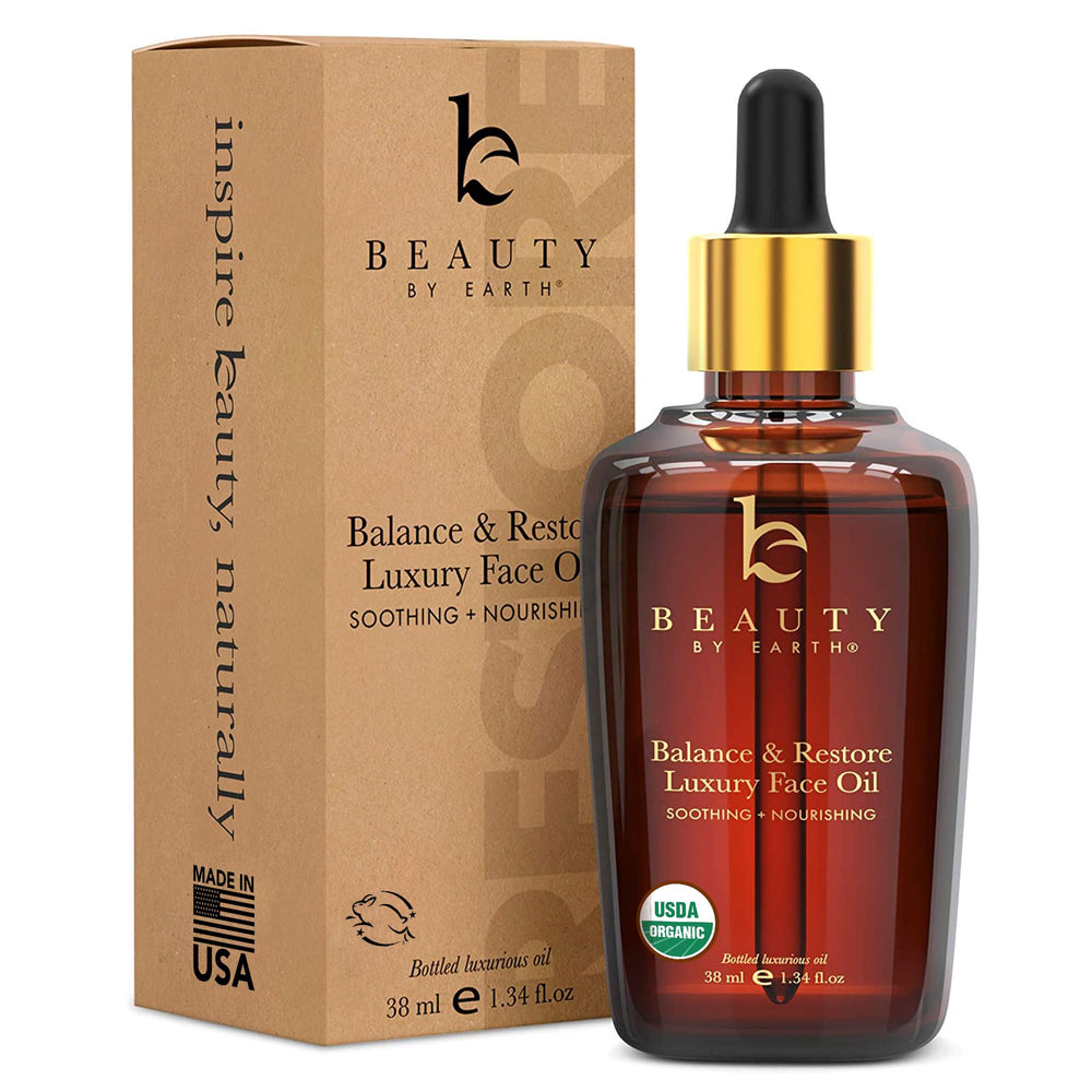 Beauty by Earth Balance & Restore bottle closeup for balanced, nourished skin.