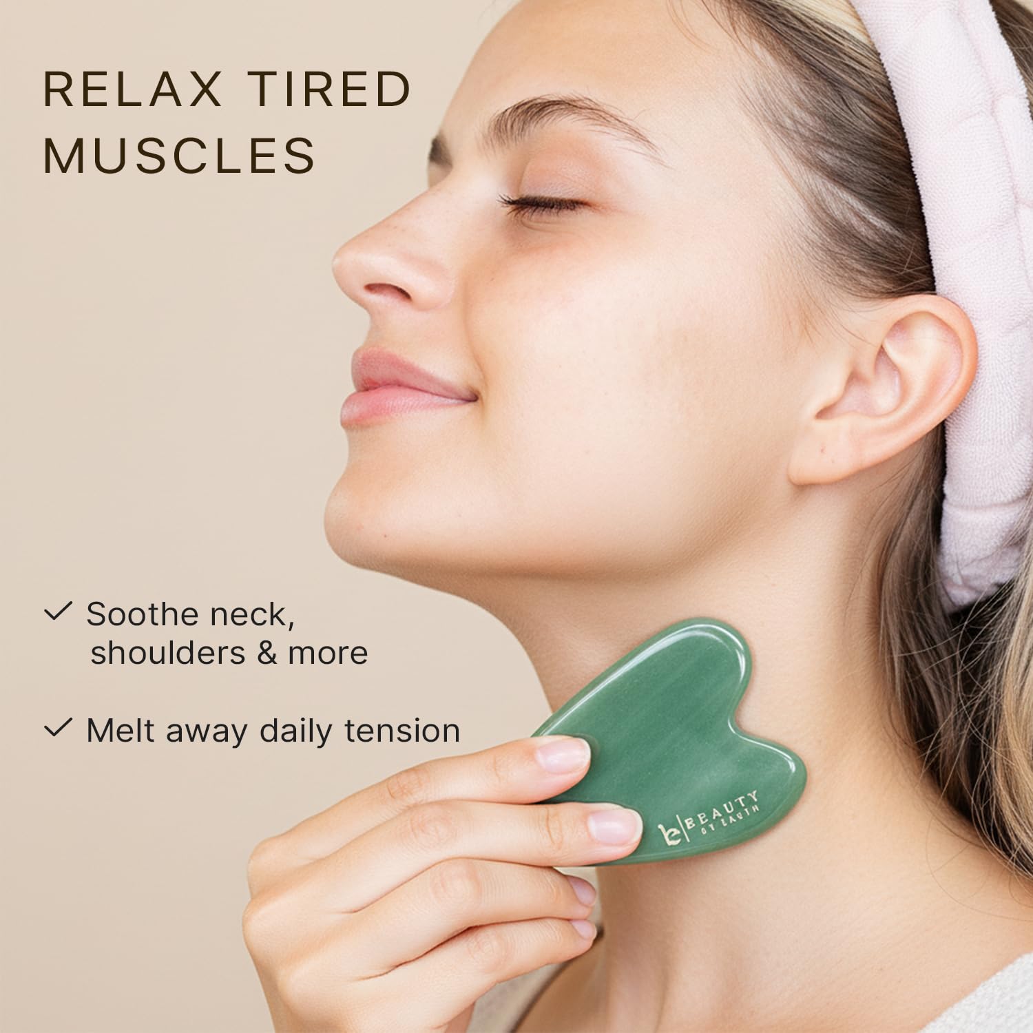 Beauty by Earth gua sha being used on back, shoulders, and neck to ease tension.