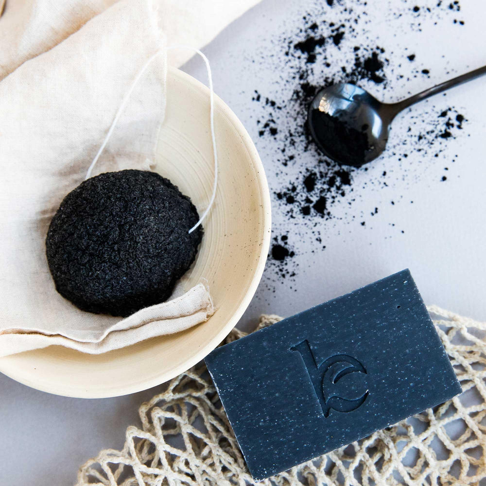 Beauty by Earth sink-side use shot illustrates daily cleansing routine for oily skin
