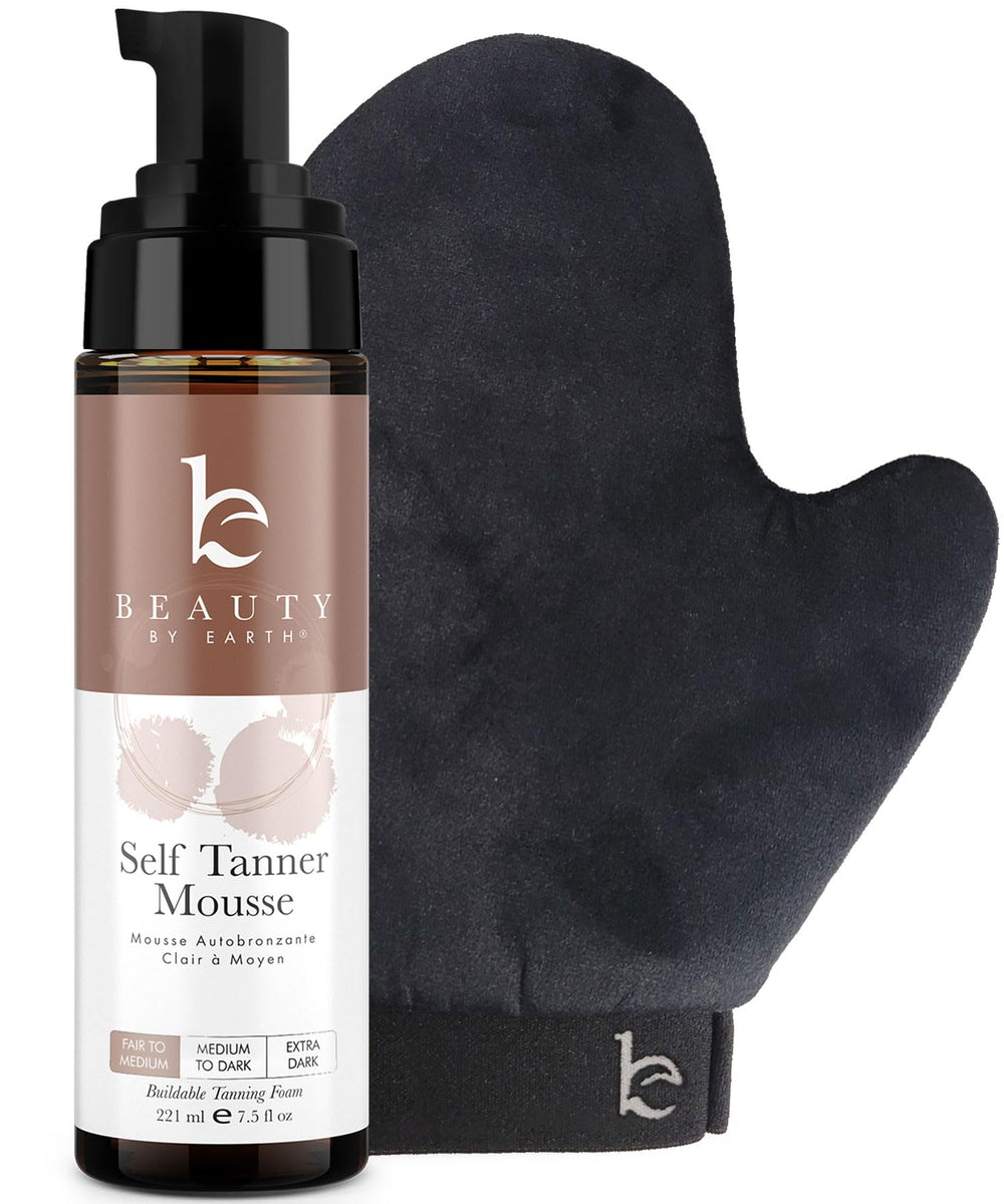 Beauty by Earth self-tanner mousse bottle for natural sun-kissed glow.