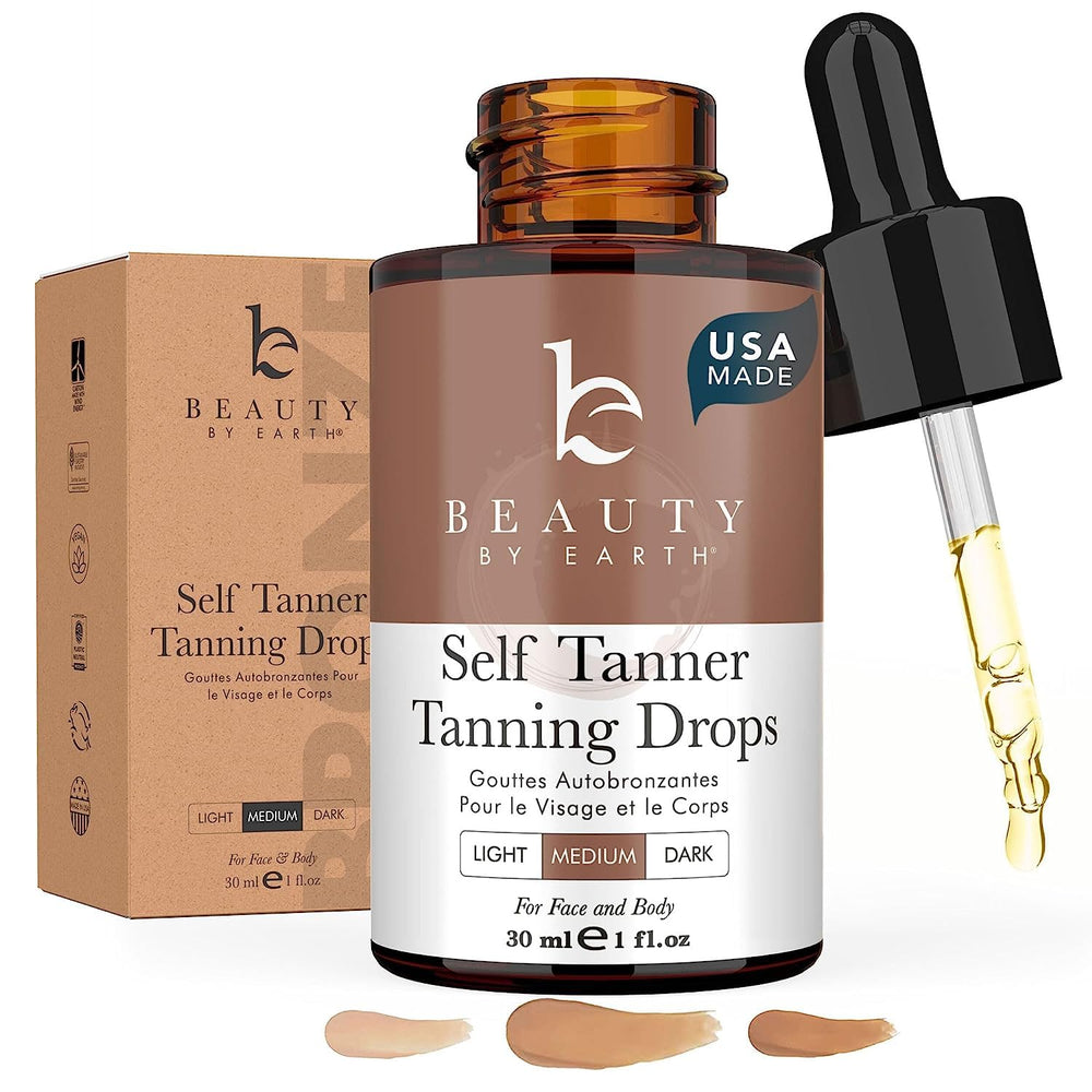 Beauty by Earth self tanning drops bottle closeup showcasing natural, streak-free color.