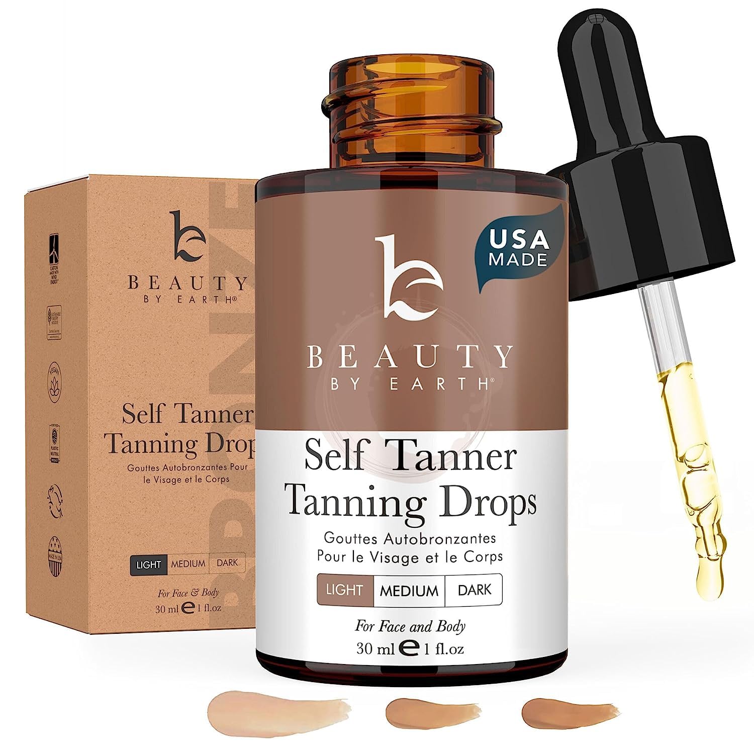 Beauty by Earth self tanning drops face bottle closeup highlights natural color for a sun-kissed glow
