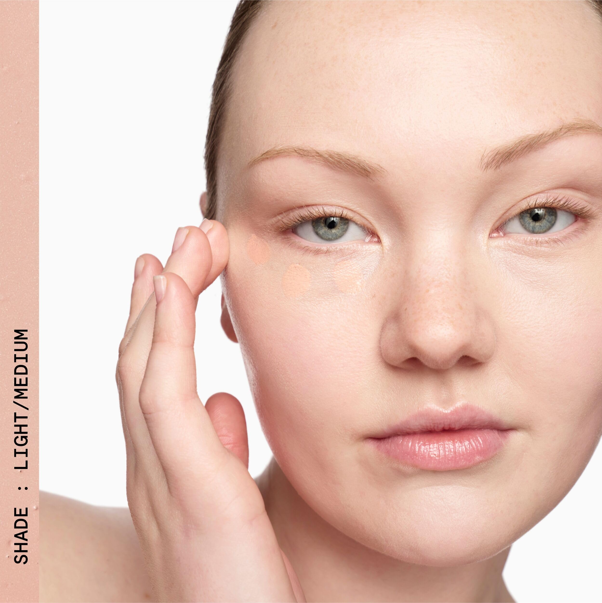 Beauty Pie Genius Corrector layered under concealer on the under-eye area for enhanced coverage