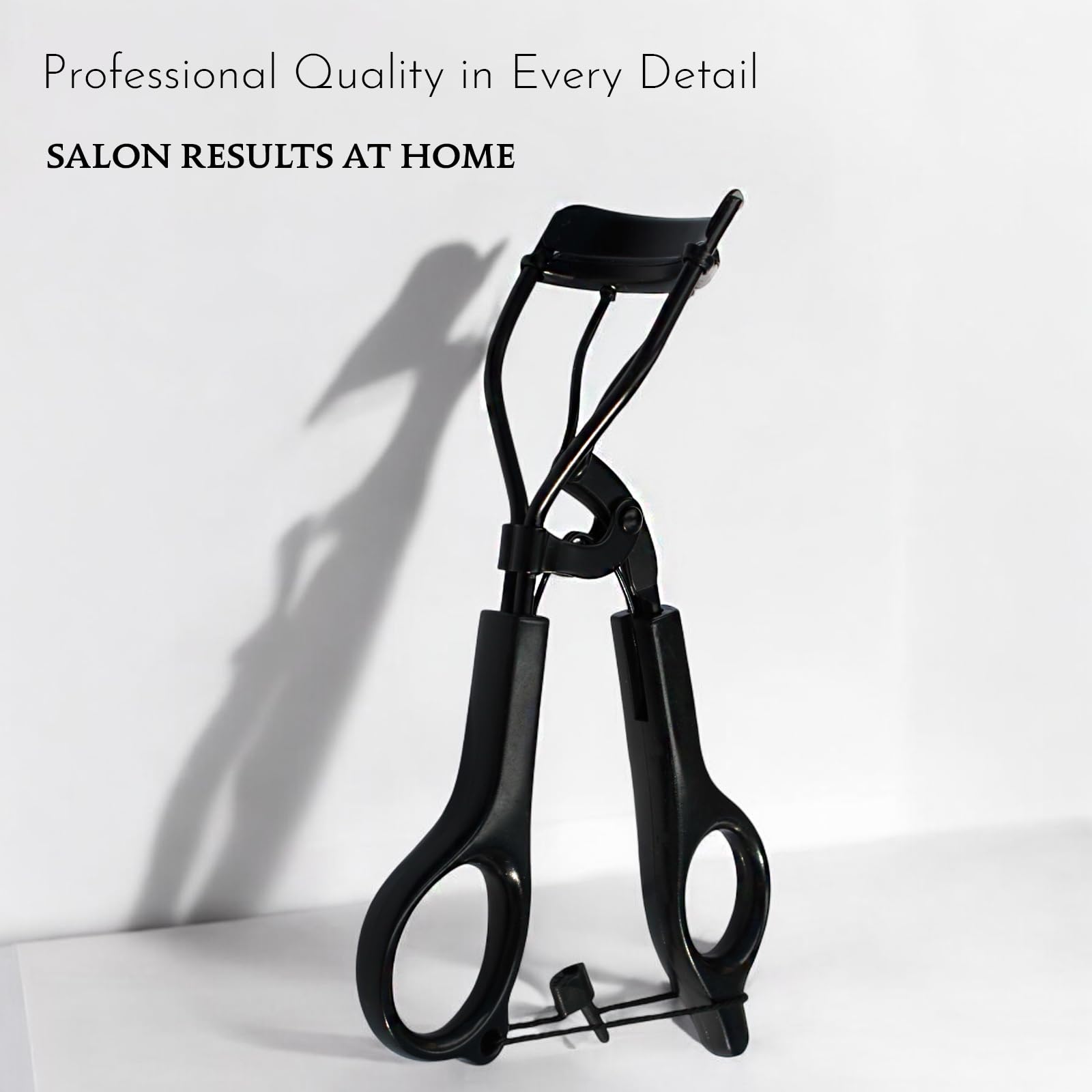 Beauty Power eyelash curler angled view emphasizes pinch-free design for safe curling.