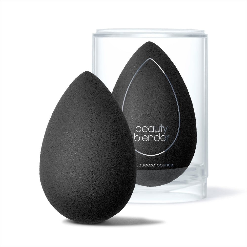 Beautyblender Pro damp sponge closeup reveals aqua-activated swelling for smooth application.