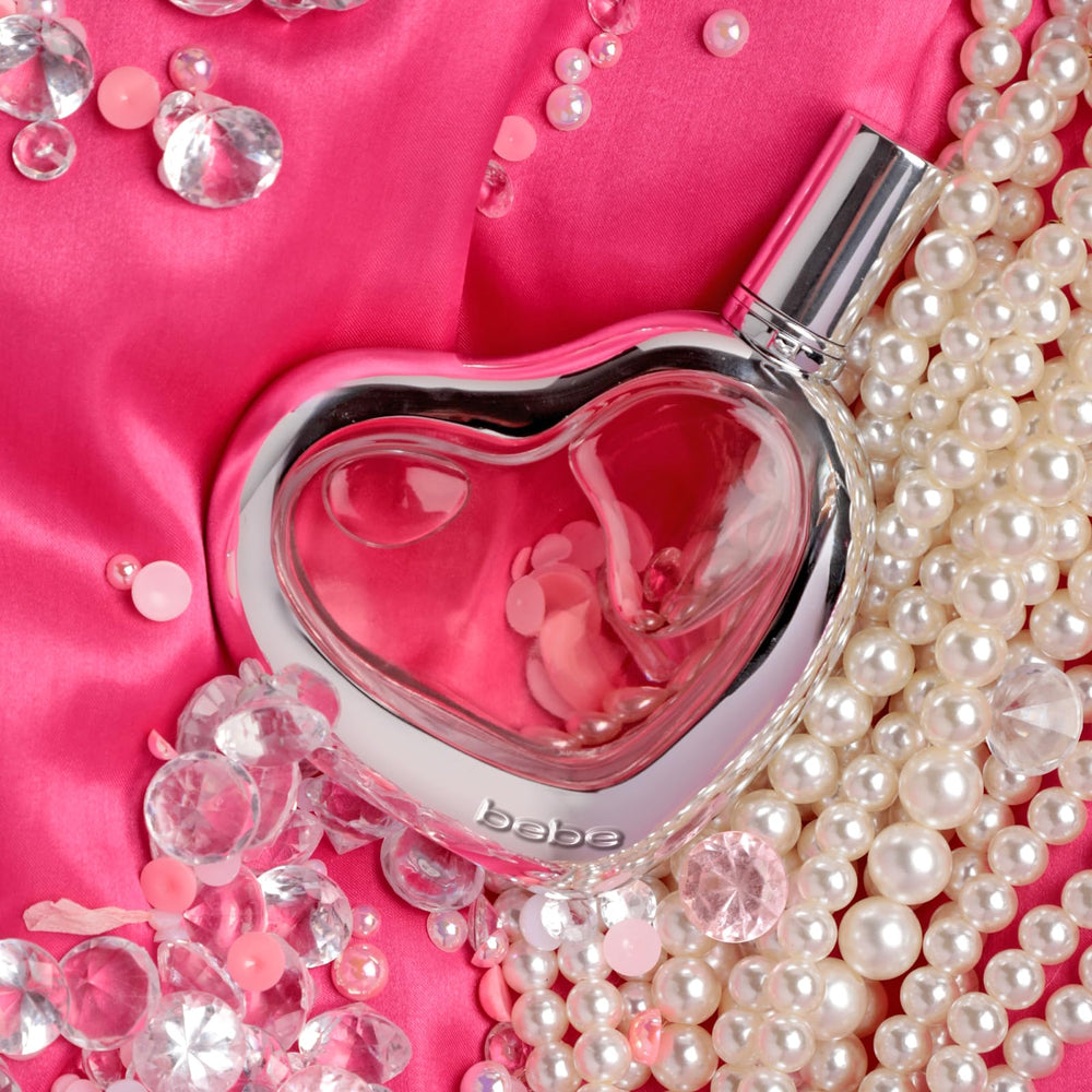 Bebe EDP amber-toned backdrop — complements evening wear mood.