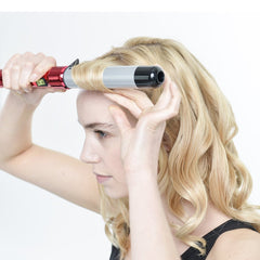 Bed Head Curlipops reaches up to 430°F for versatile styling options.