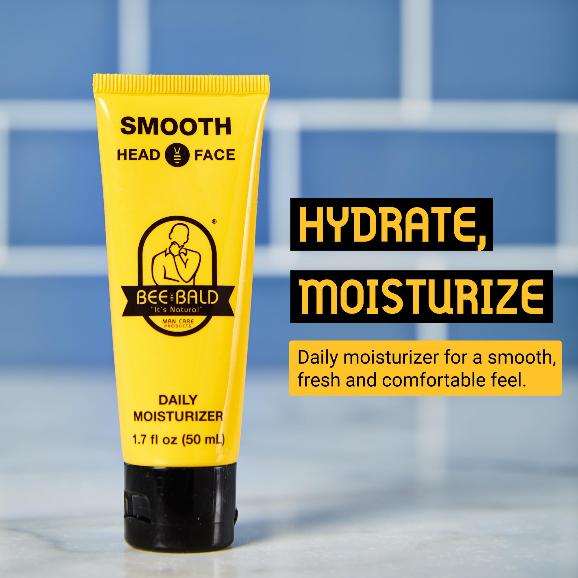 Bee Bald SMOOTH hand applying moisturizer for hydration and shine control