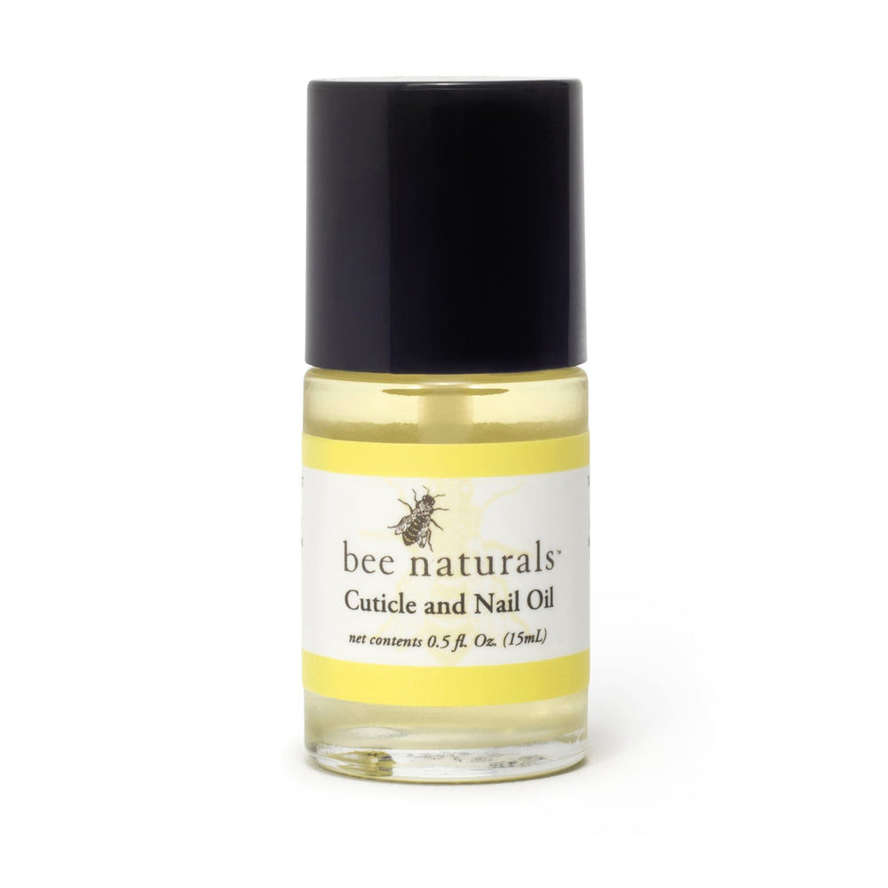 Bee Naturals oil being applied to nails and cuticles