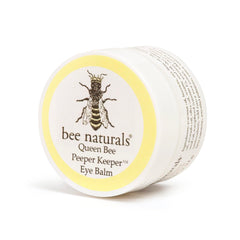 Queen Bee Best Eye Balm packaging shot featuring multi-oil blend for nourishing skin.