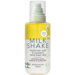 Beekman 1802 Milk Shake bottle closeup highlighting fragrance-free hydration for sensitive skin