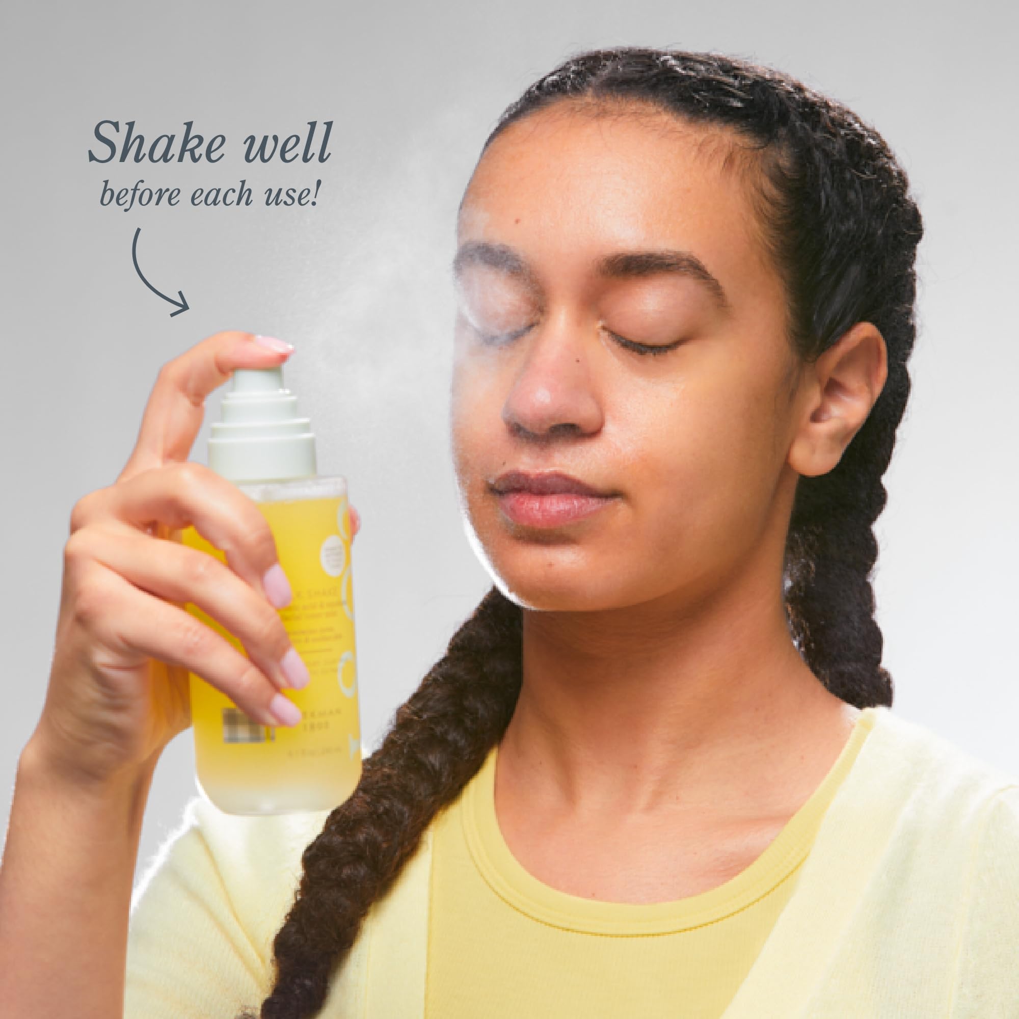 Beekman 1802 Milk Shake Mini Face Mist spray-atomizer in use for refreshing hydration.