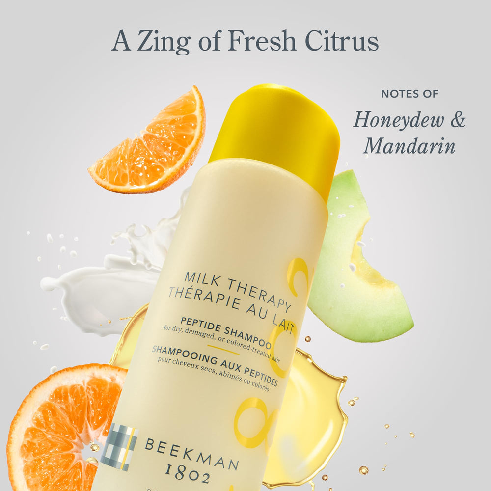 Beekman 1802 Milk Therapy Peptide Shampoo bottle on bathroom shelf for daily care.