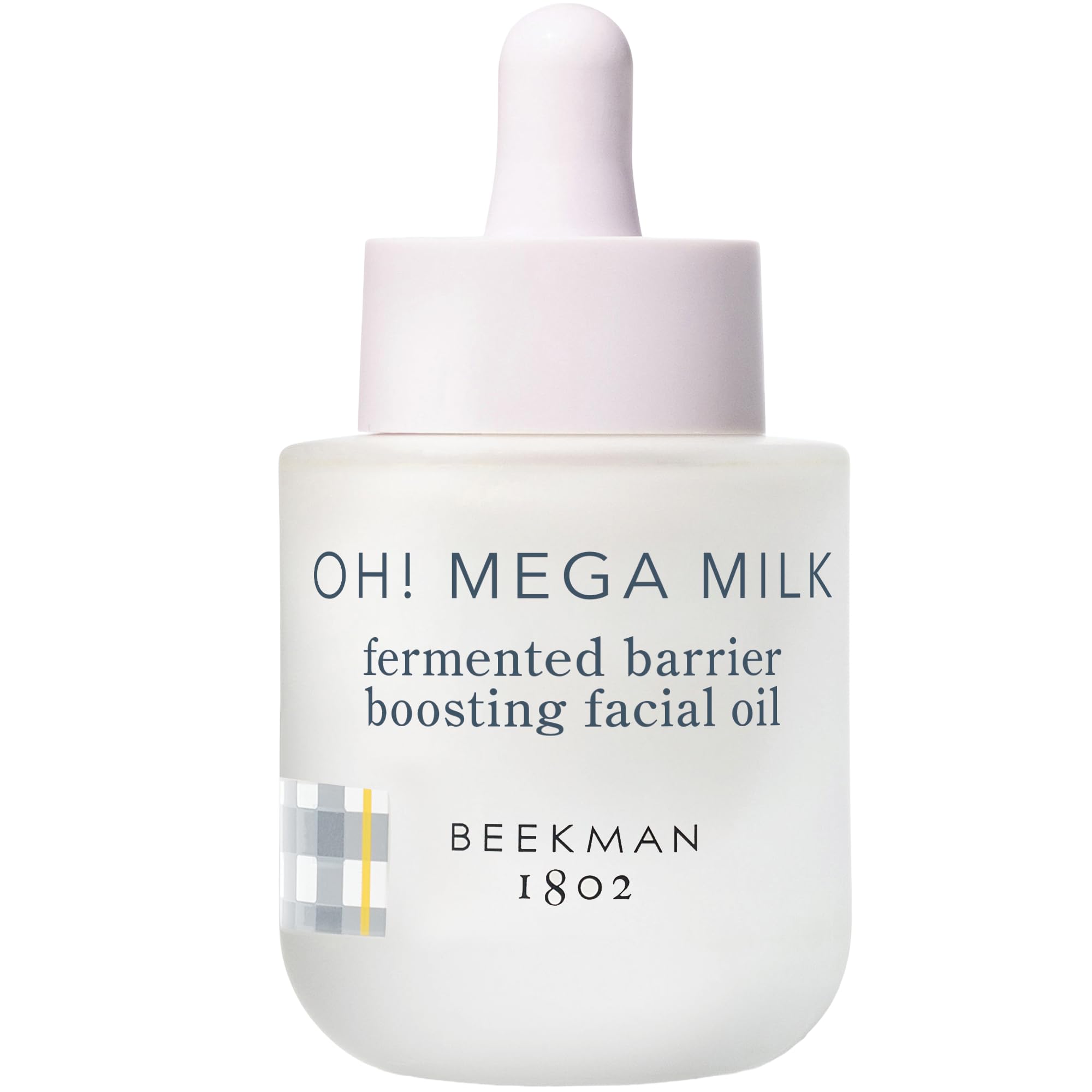 Beekman 1802 Oh! Mega Milky Oil bottle closeup showing a silky glow and barrier support.