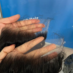 Beeos Brazilian virgin hair 5x5 closure in life-like curl ready for styling.