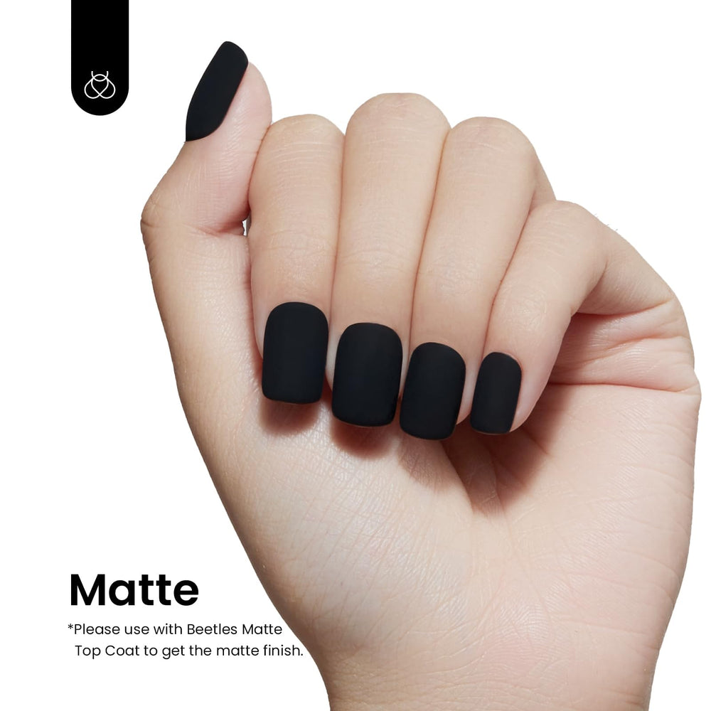 Beetles Black Winter Gel Polish cured under lamp demonstrates proper curing time.