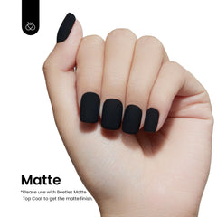 Beetles Black Winter Gel Polish cured under lamp demonstrates proper curing time.