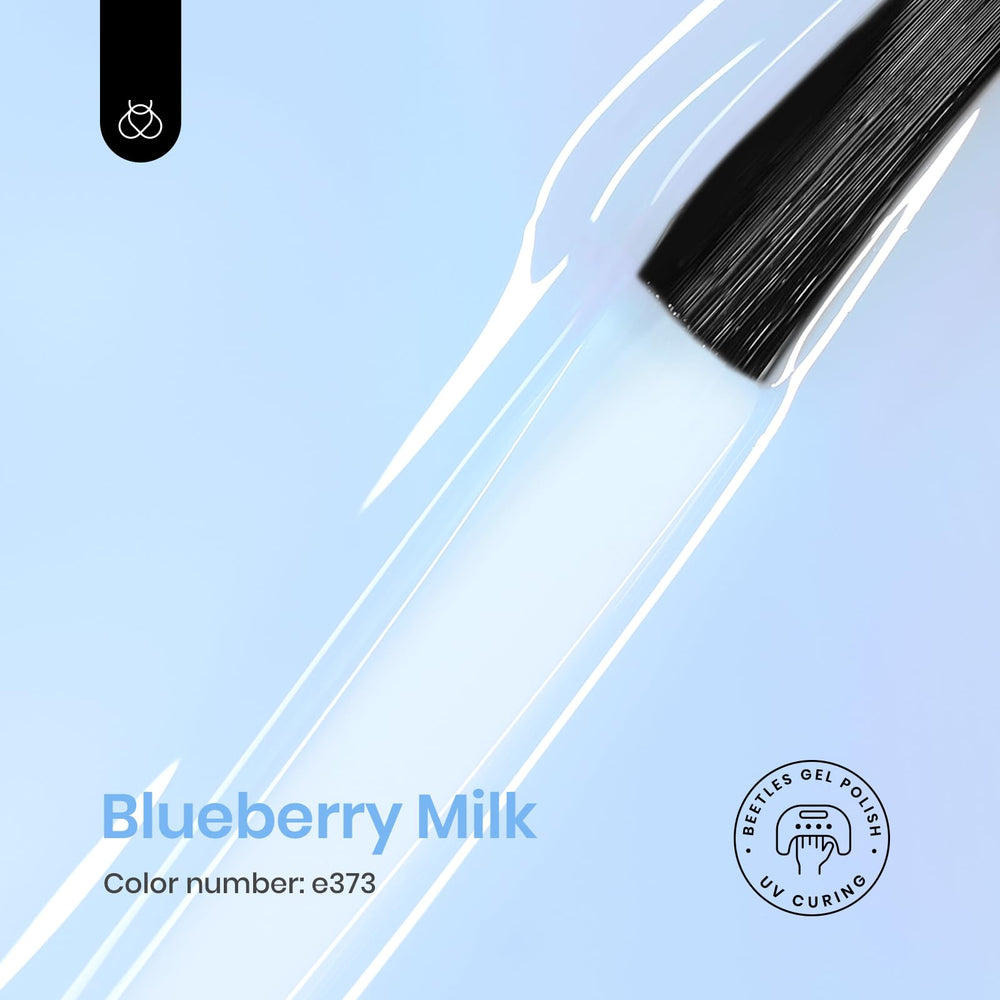 Beetles Blueberry Milk swatch highlights sheer blue finish for subtle nail art