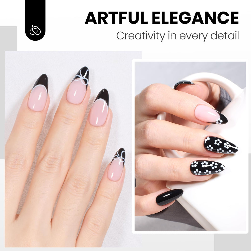 Beetles chic black-and-white nails show a modern manicure style.
