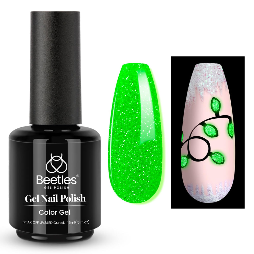 Beetles Christmas Gel Polish bottle glowing after light exposure for holiday flair.
