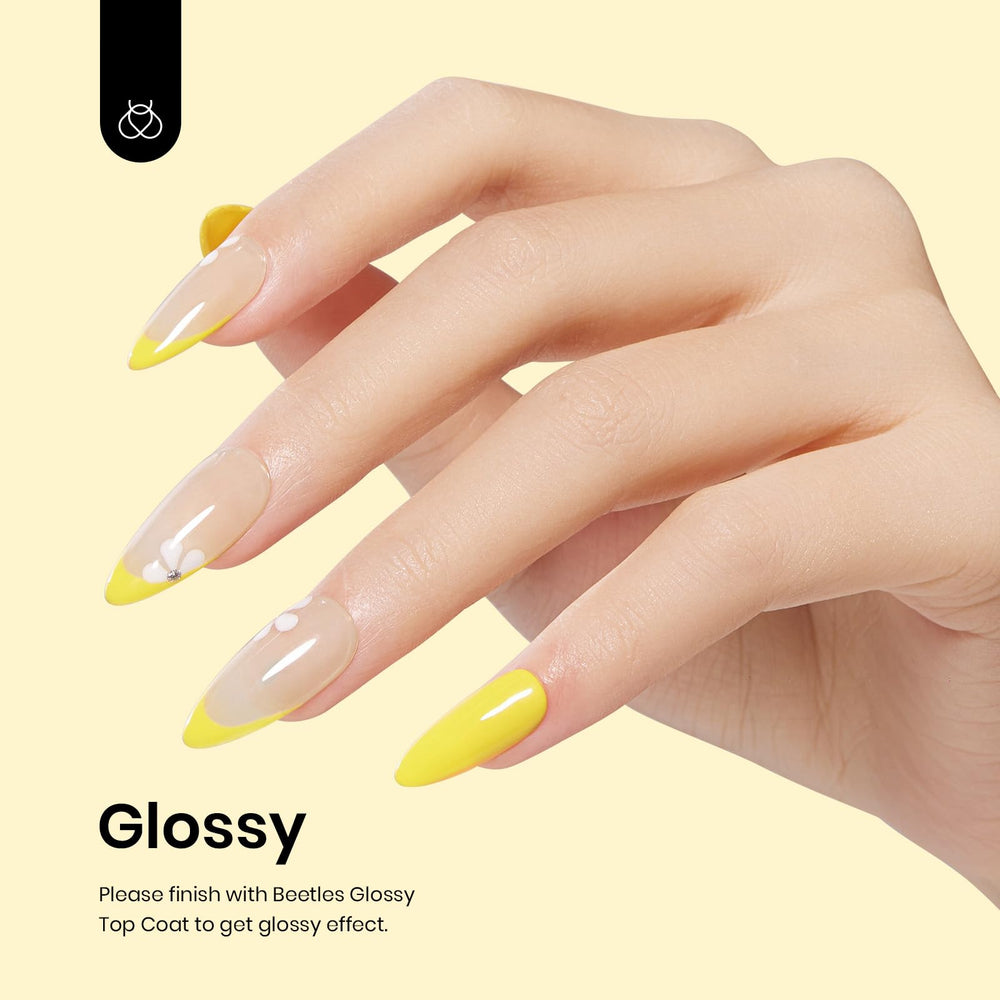 Beetles Gel Polish Canary Yellow on hand demonstrates long-lasting color and glossy finish