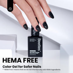Beetles Gel Polish Classic Black nails showcase glossy winter-ready finish.