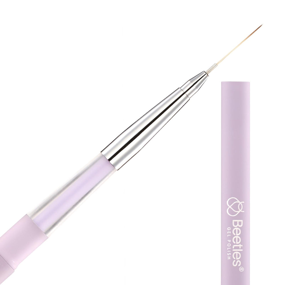 Beetles Gel Polish liner brush used in a DIY home manicure for precise detailing.