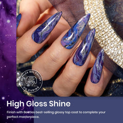 Beetles Lost Universe silver glitter gel polish adds shimmering accent and depth.