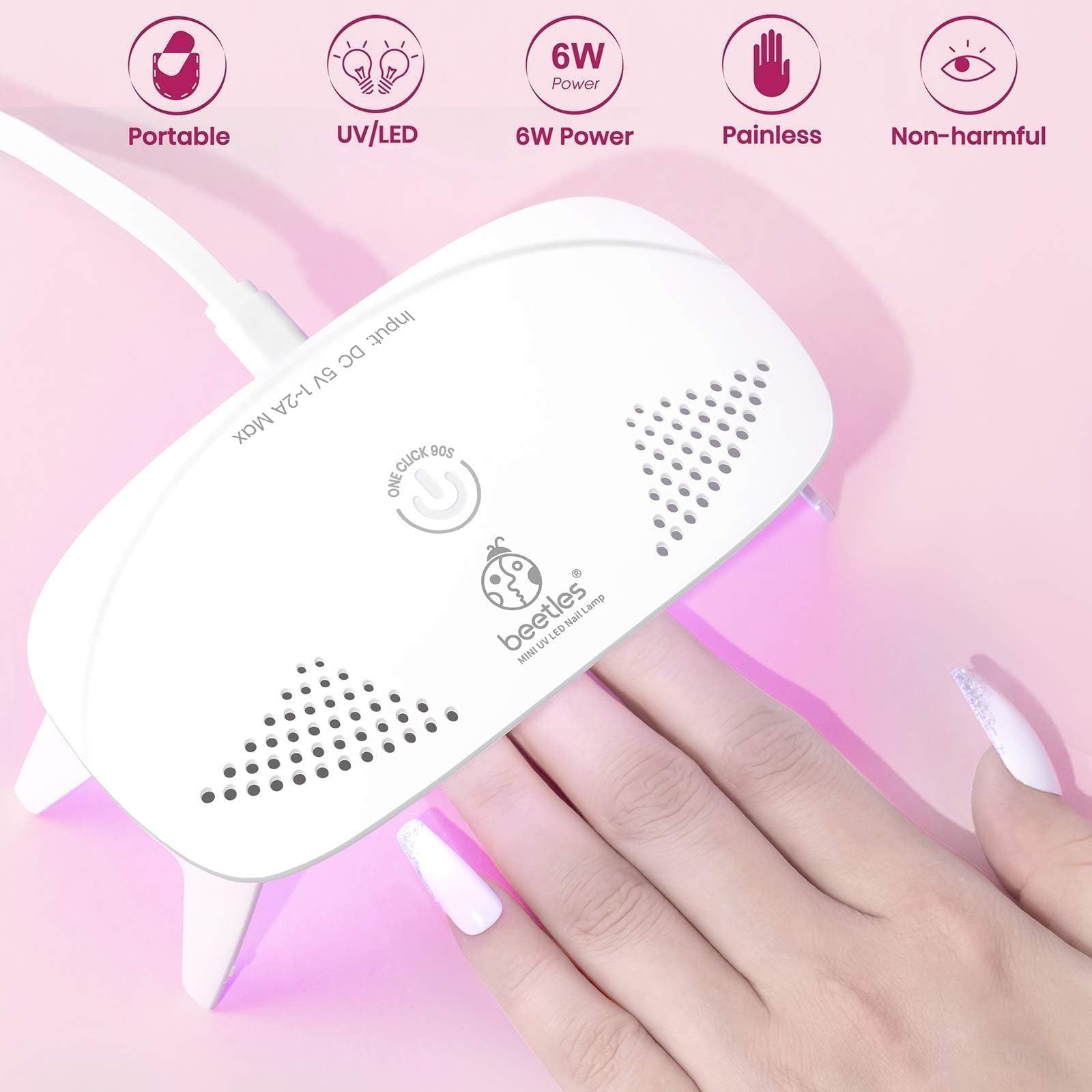 Beetles UV light demonstrates one-button operation for quick nail sessions.