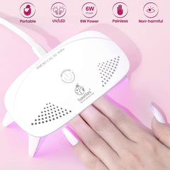 Beetles UV light demonstrates one-button operation for quick nail sessions.