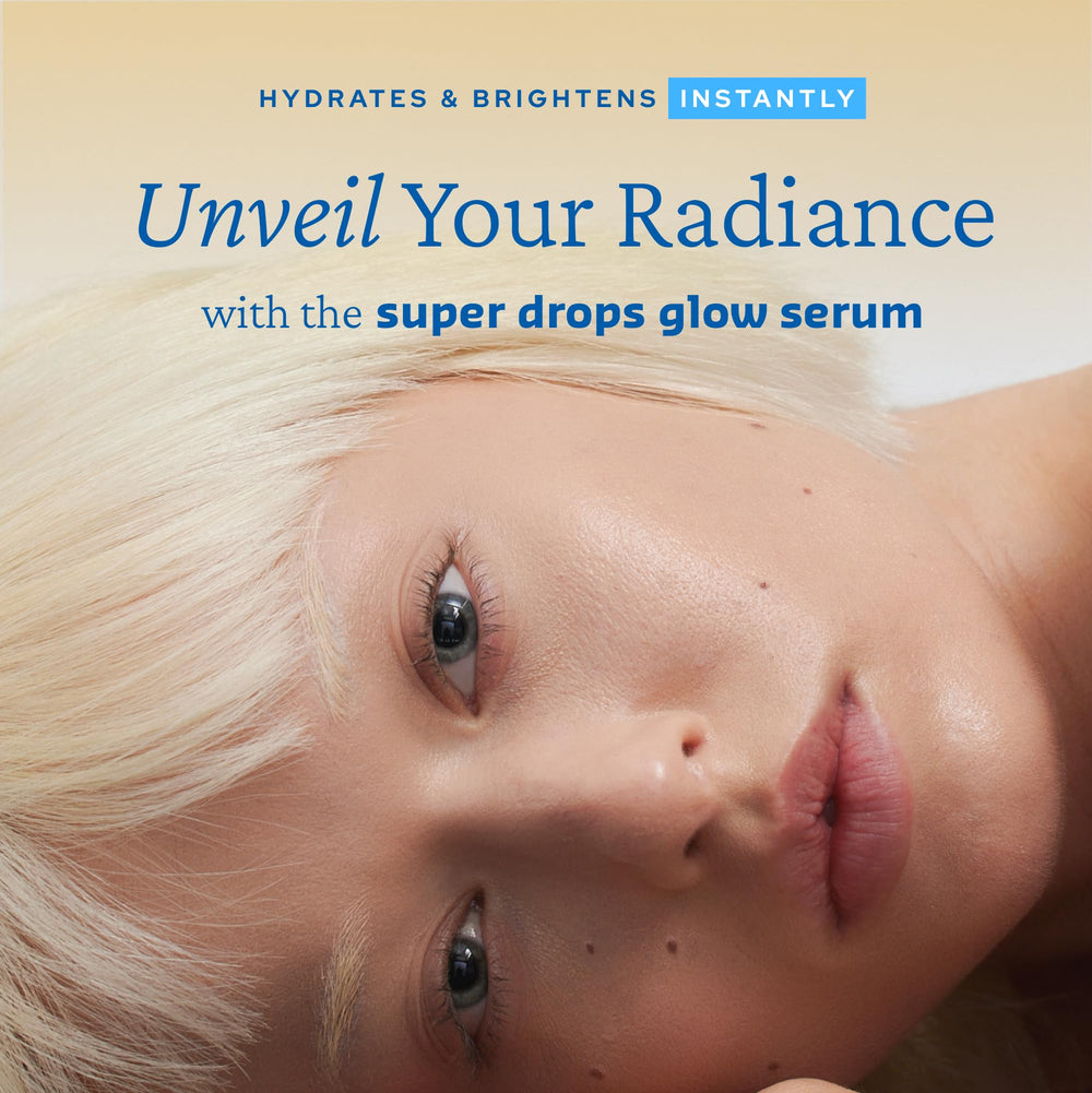 Belif Golden Glow serum on cheek shows dewy, luminous skin.